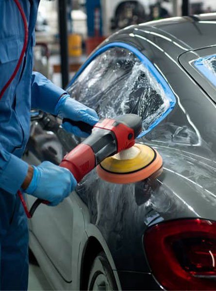person buffing car